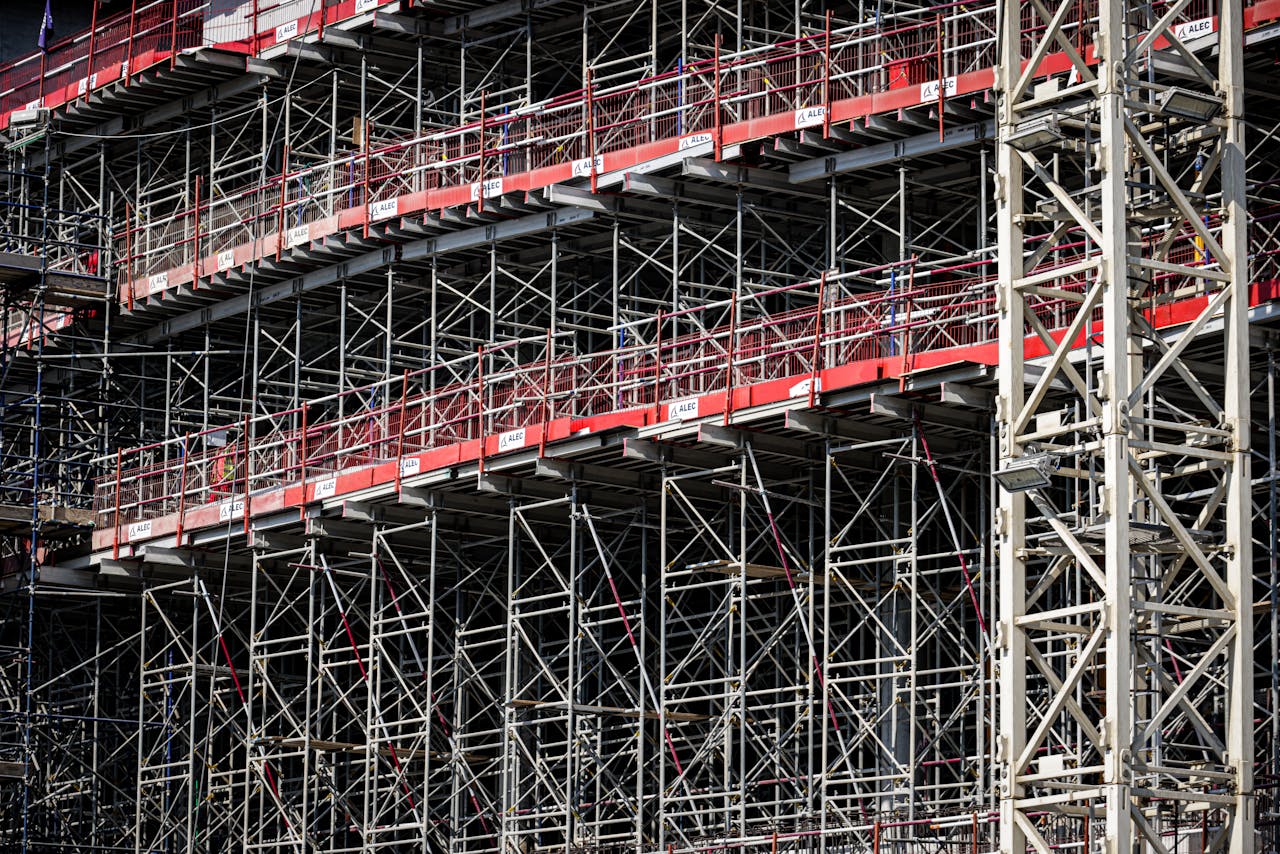 services-04 A detailed view of steel scaffolding on a construction site, showcasing architectural design.