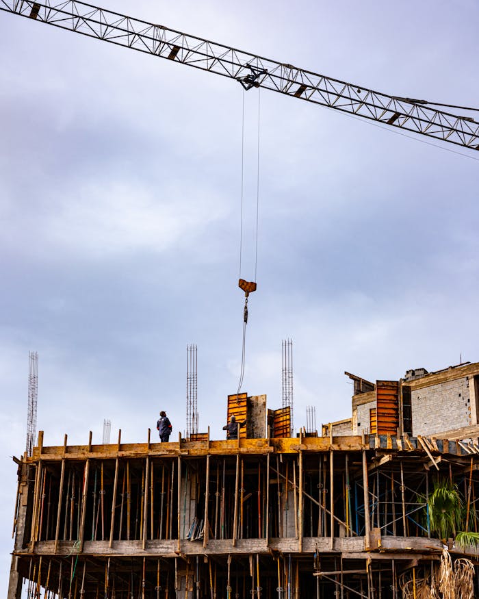 services-01 Building under construction with crane in Marrakesh, Morocco showcasing urban development.